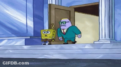 Man In Suit Standing Next To Spongebob GIF