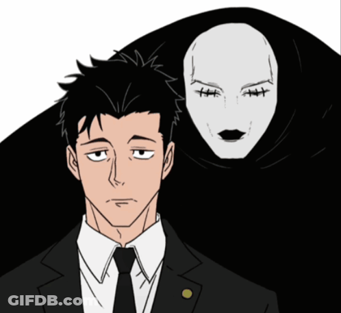 Man In Suit Standing Next To Woman With Mask GIF