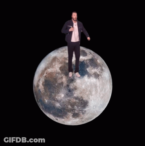 Man In Suit Standing On Moon GIF