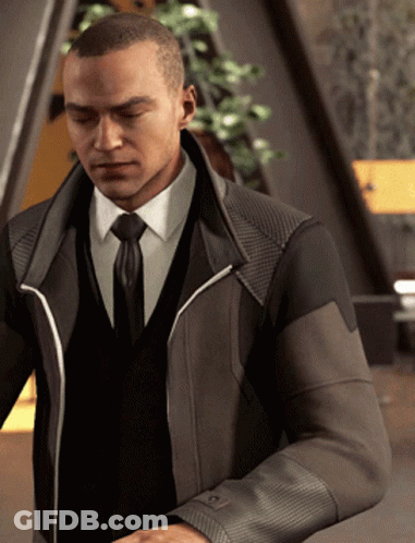 Man In Suit Standing With Eyes Closed GIF