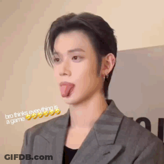 Man In Suit Sticking Tongue Out GIF