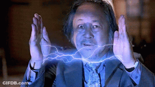 Man In Suit Surrounded By Lightning Strikes GIF
