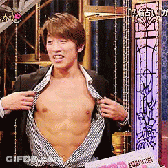 Man In Suit Taking Off Shirt GIF