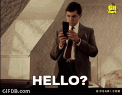 Man In Suit Taking Selfie Saying Hello GIF