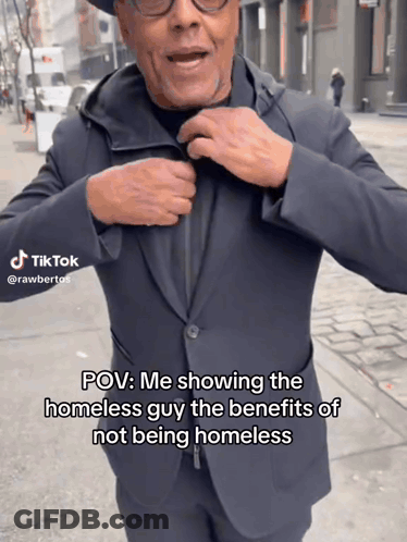 Man In Suit Talking About Benefits Of Not Being Homeless GIF