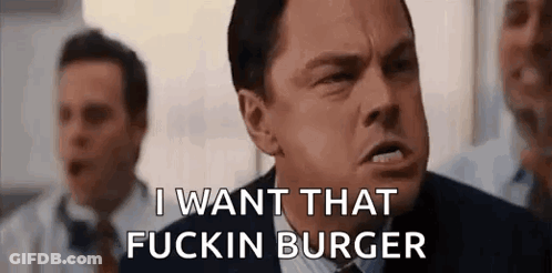 Man In Suit Talking About Burger GIF