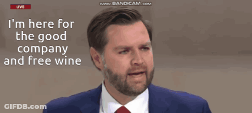 Man In Suit Talking About Company And Free Wine GIF