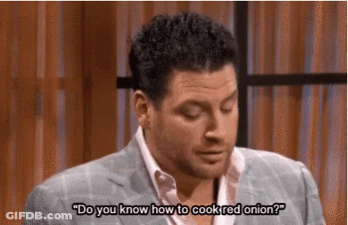 Man In Suit Talking About Cooking Red Onion On TV GIF