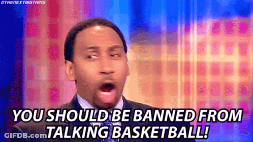 Man In Suit Talking Basketball GIF