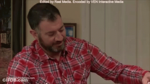 Man In Suit Talking In Kitchen Hansenvspredators.com GIF