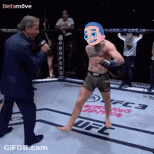 Man In Suit Talking Into Microphone Beside Boxing Ring Cartoon GIF