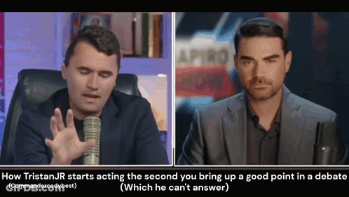 Man In Suit Talking Into Microphone With Onlooker GIF