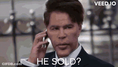 Man In Suit Talking On Cell Phone Asking If He Sold GIF