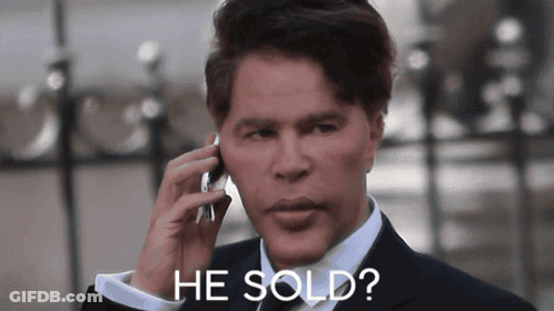 Man In Suit Talking On Cell Phone Saying He Sold GIF