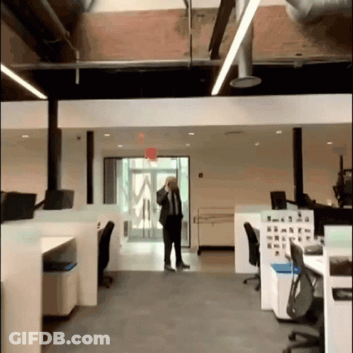 Man In Suit Talking On Cell Phone GIF