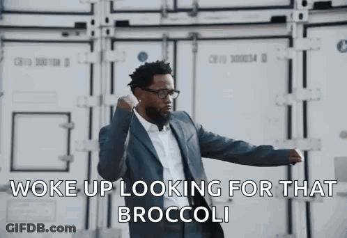 Man In Suit Talking On Cell Phone GIF