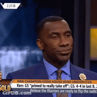 Man In Suit Talking On News GIF