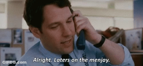 Man In Suit Talking On Phone Saying Alright Laters On The Menjay GIF