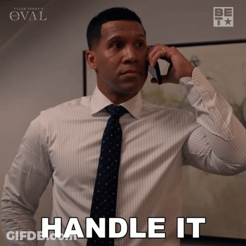 Man In Suit Talking On Phone Saying Handle It GIF