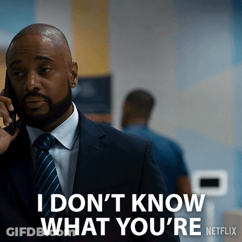 Man In Suit Talking On Phone GIF