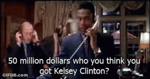 Man In Suit Talking On Phone While Another Man Looks On GIF