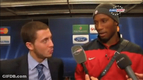Man In Suit Talking To Another GIF