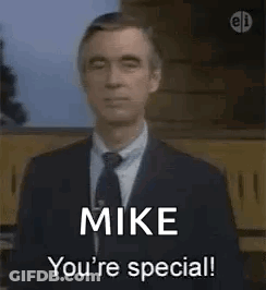 Man In Suit Talking To Another GIF