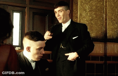 Man In Suit Talking To Another Man GIF