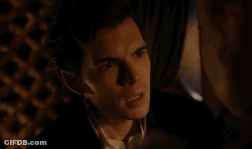 Man In Suit Talking To Another Man GIF
