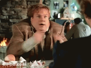 Man In Suit Talking To Another Man At Restaurant GIF