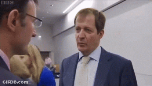 Man In Suit Talking To Another Man BBC GIF