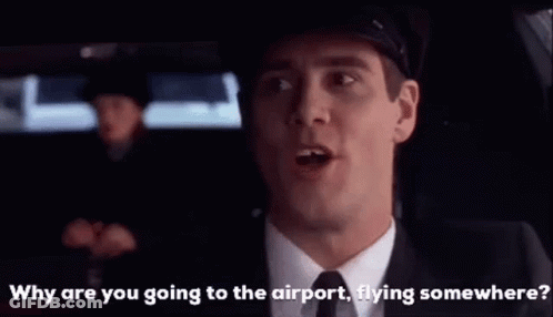 Man In Suit Talking To Another Man In Car GIF