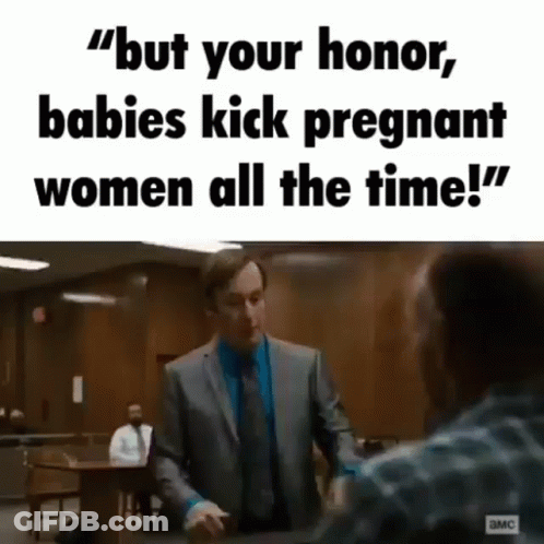 Man In Suit Talking To Another Man In Courtroom GIF
