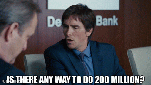 Man In Suit Talking To Another Man In Front Of De Bank Sign GIF