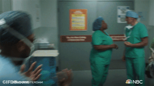 Man In Suit Talking To Another Man In Kitchen With NBC GIF