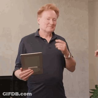 Man In Suit Talking To Another Man In Spanish GIF