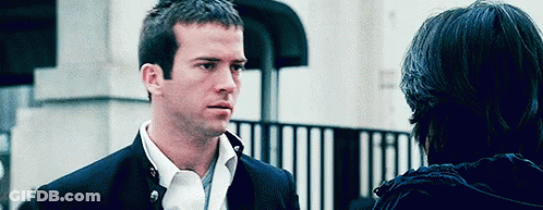 Man In Suit Talking To Another Man GIF