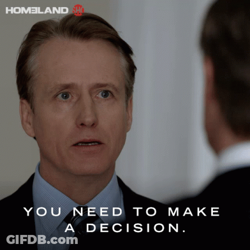 Man In Suit Talking To Another Man Saying You Need To Make A Decision GIF