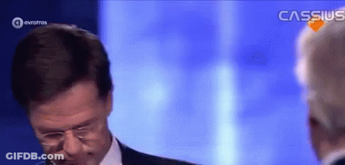 Man In Suit Talking To Another Man GIF