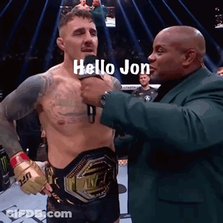 Man In Suit Talking To Boxer GIF