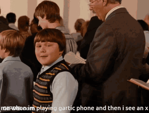 Man In Suit Talking To Boy In Striped Vest Playing Gartic Phone GIF