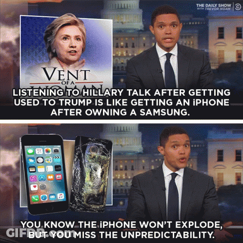 Man In Suit Talking To Hillary Clinton GIF