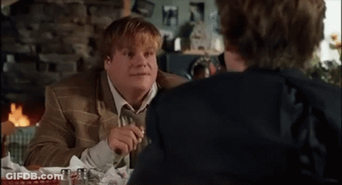 Man In Suit Talking To Man In Blue Shirt GIF