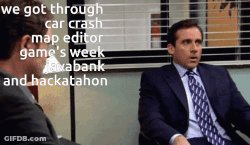 Man In Suit Talking To Man In Chair GIF