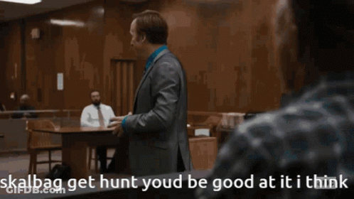Man In Suit Talking To Man Skalbag Get Hunt GIF