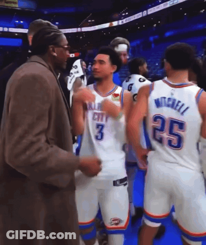 Man In Suit Talking To Player Number 3 GIF