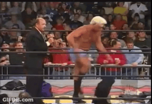 Man In Suit Talking To Referee GIF