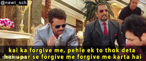 Man In Suit Talking To Sunglasses Man GIF