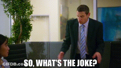 Man In Suit Talking To Woman In Office GIF