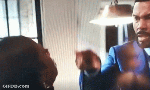 Man In Suit Talking To Woman GIF